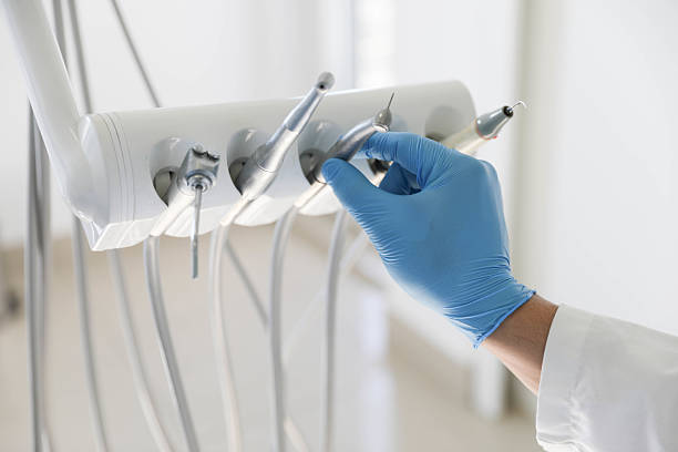 Professional Tooth Extraction technician working in Franklin Center, NJ